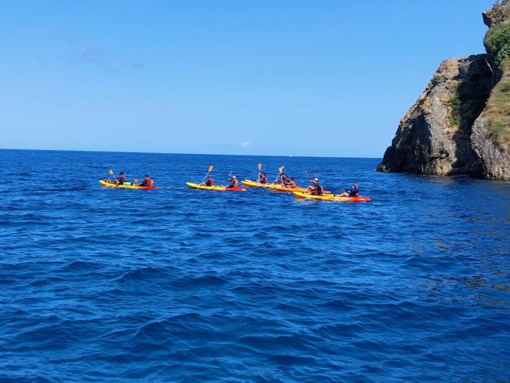 group of people kayaking in azores